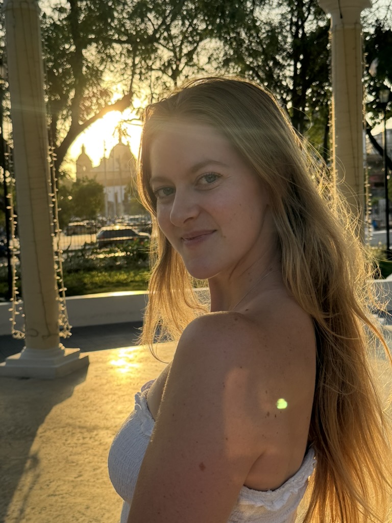 Shelby outside in warm golden-hour light